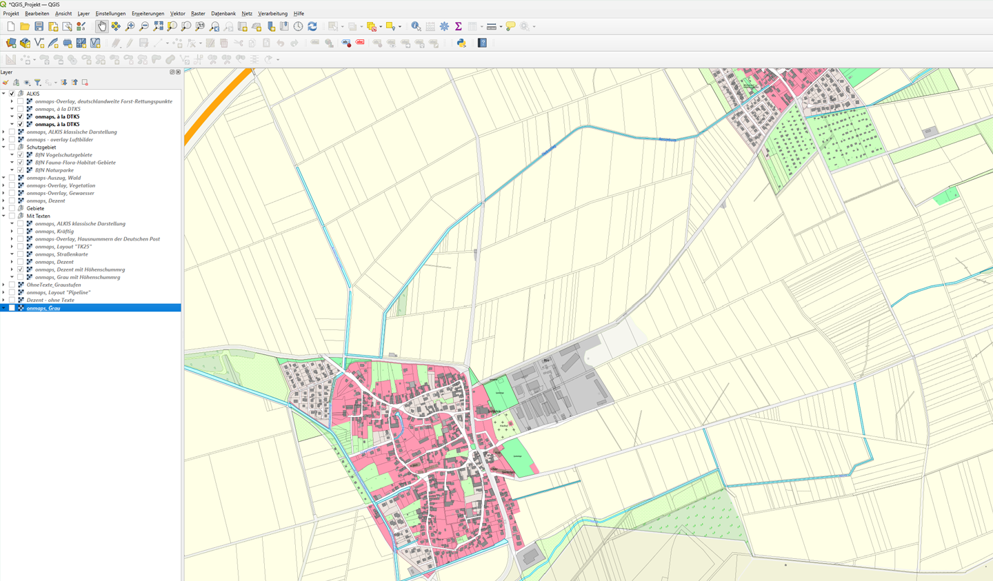 ALKIS-Daten in QGIS mit umfassender Kartenvisualisierung QGIS-Software mit geöffneter ALKIS-Karte, die verschiedene Ebenen von Gebäuden und Flächen zeigt.
